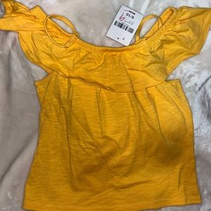 Girl yellow shoulder shirt